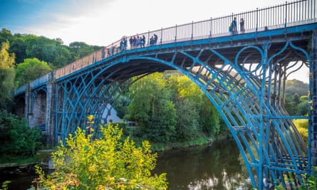 People walking over the Ironbridge in Shropshire UK