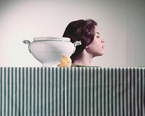 Claire Aho's untitled photograph showing woman and ceramic bowl above striped surface.