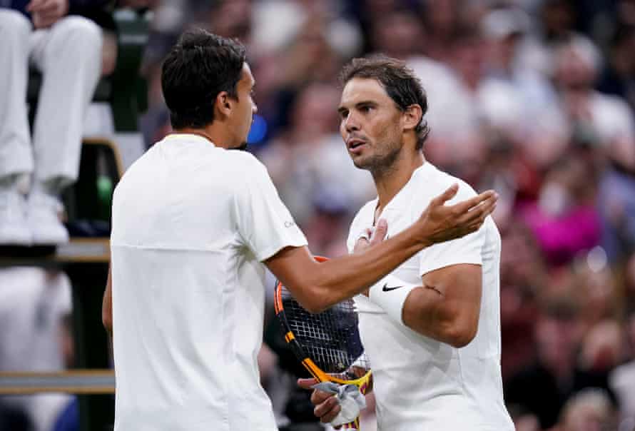 Rafael Nadal (right) and Lorenzo Sonego exchange words after the match