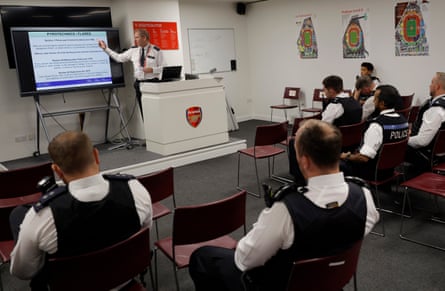 Chief inspector Pete Dearden gives a briefing in the police room inside the stadium three hours before kick-off in the match between Arsenal and Chelsea.
