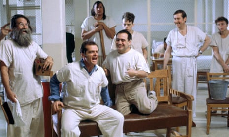 Jack Nicholson, seated, as Randle McMurphy in One Flew Over the Cuckoo’s Nest (1975).