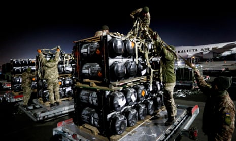 Ukrainian service members unpack US Javelin missile systems in February 2022