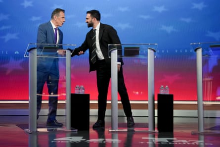 Andrew Cuomo and Zohran Madani shake hands before the debate.