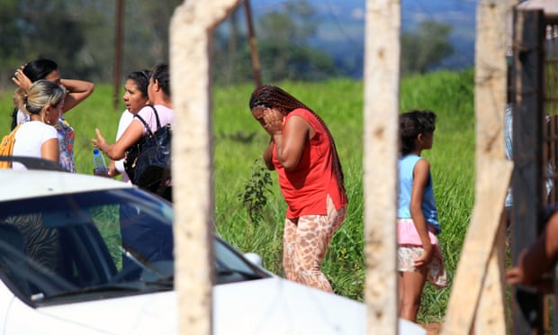 Relatives waiting for information outside the state prison in Goiás, Brazil, on 1 January. 