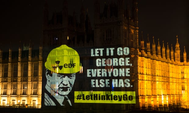 A message to the chancellor, George Osborne, projected by Greenpeace on the Houses of Parliament