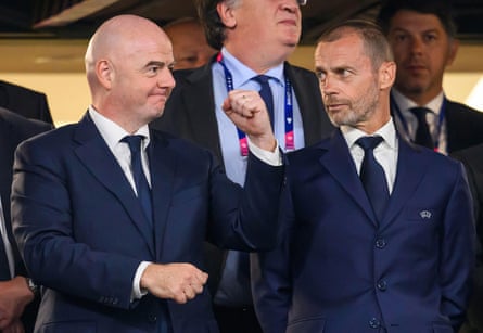 Gianni Infantino stands next to Aleksander Ceferin