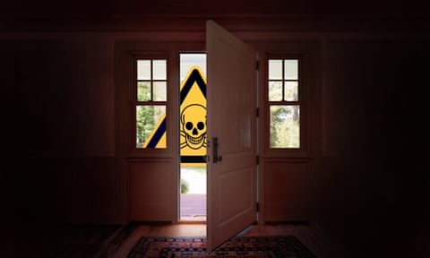 interior of home with toxic danger warning sign visible outside