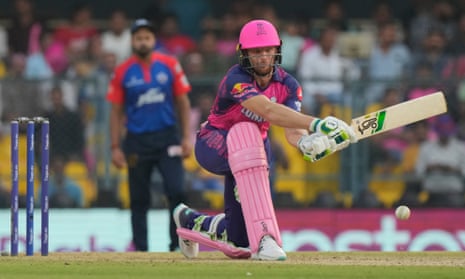 Rajasthan Royals's Jos Buttler plays a reverse sweep