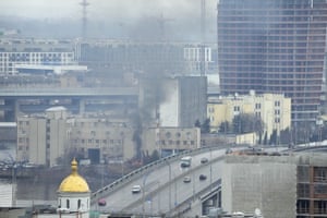 Smoke and flame rise near a military building after an apparent Russian strike in Kyiv, Ukraine. Big explosions were heard before dawn in Kyiv, Kharkiv and Odesa