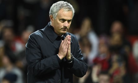 José Mourinho gestures to supporters after the EFL Cup win.