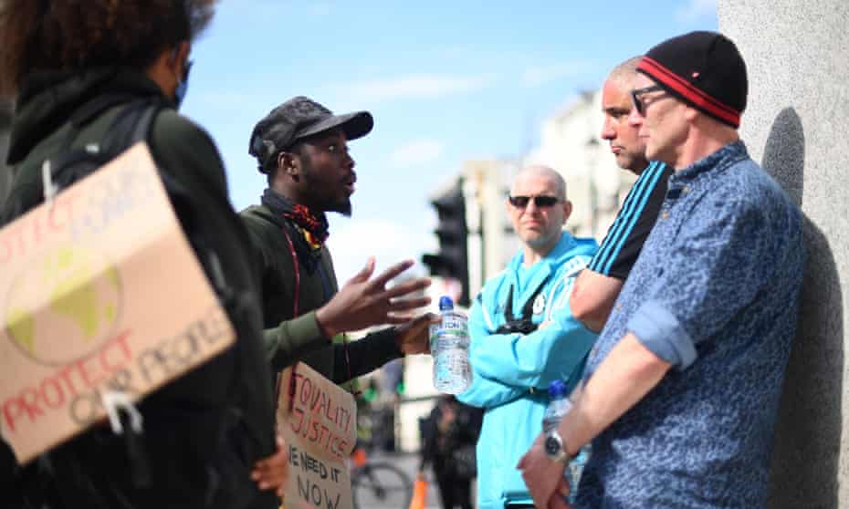 BLM demonstrators arguing with EDL supporters during a rally at the Churchill statue in Parliament Square, London
