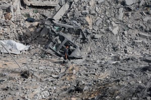 Zawayda, Gaza StripA Palestinian walks at the site of an Israeli strike on a house that took place in the central Gaza Strip