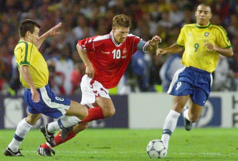 Michael Laudrup dances his way past Dunga and Ronaldo at the 1998 World Cup.