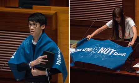 Sixtus ‘Baggio’ Leung and Yau Wai-ching with anti-China banners during their swearing-in ceremony.