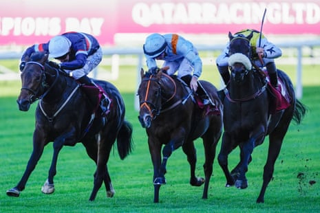 Charles Bishop on Night In Vegas leads two rivals in a close horse race finish