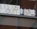 Signs on display at Manchester Metropolitan University.