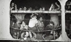 Jewish refugees on the Exodus as it arrives in Haifa in Palestine on 18 July 1947.