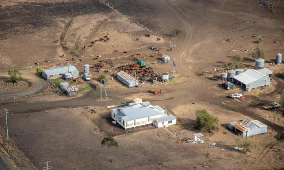 Aerial photo of part of a large agricultural district in Queensland, Australia. Large, mostly rectangular paddocks of varying sizes and colour reflect the drought affected area of the crops in different paddocks