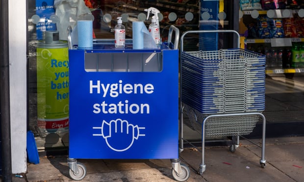 A Covid-19 hygiene station outside a Tesco Express in Ascot High Street in Berkshire