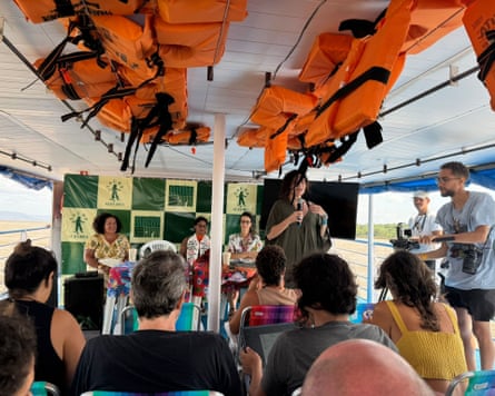 Indigenous leaders, forest defenders, artists and scientists onboard the Sumaúma boat to Cop30
