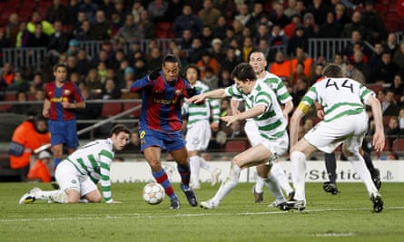 Ronaldinho surrounded by four Celtic players during a Champions League match in March 2008.