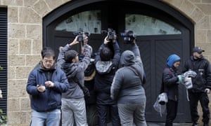 Journalists crowd outside a house in Beirut thoughtto be where former Nissan chief Carlos Ghosn has been living since leaving Japan.