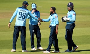 England’s Adil Rashid (second right) celebrates taking the wicket of Ireland’s Kevin O’Brien.