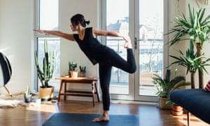 Young woman doing yoga exercise at homeGettyImages-1217598232