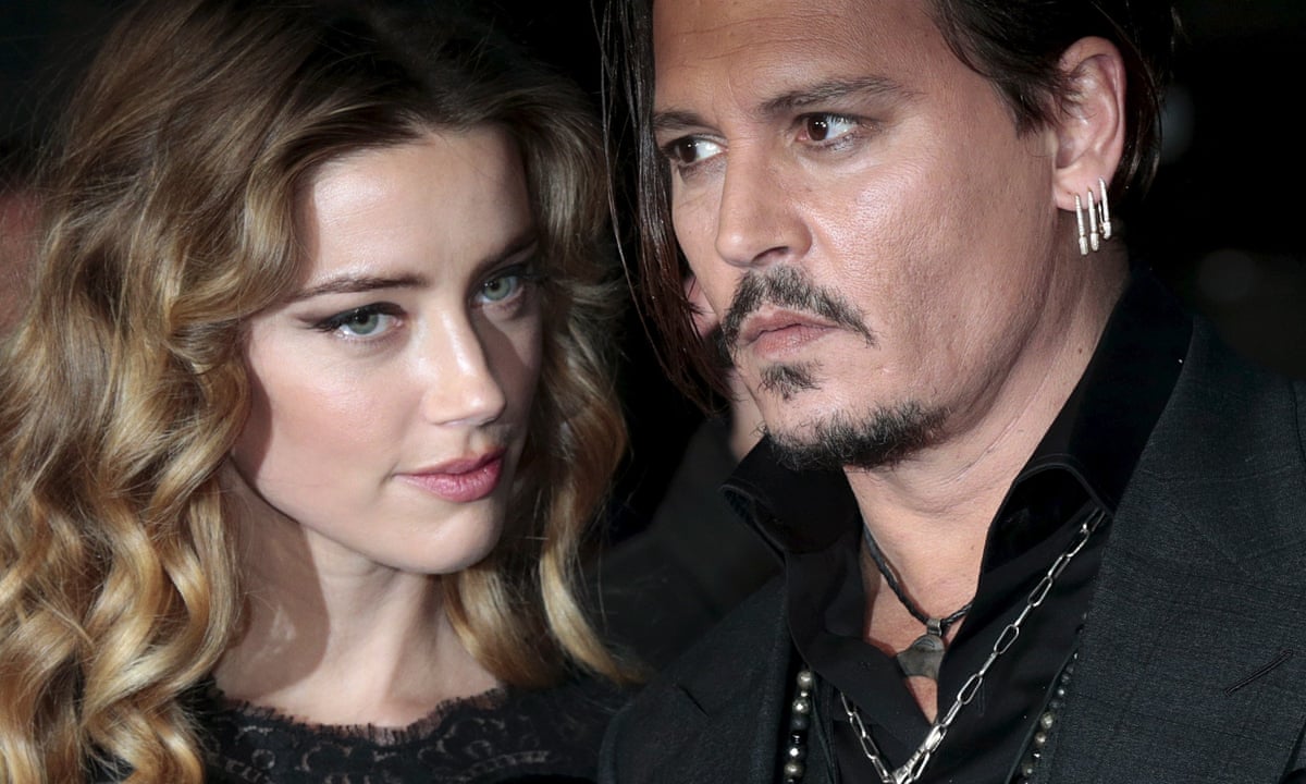 Amber Heard's legal team condemns Johnny Depp abuse denials | Johnny Depp | The Guardian