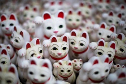 Maneki-neko statues, also known as beckoning cat, are seen at Gtokuji temple in the International Cat Day in Tokyo on 8 August.