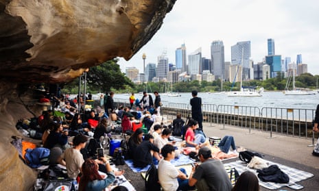 Crowds gather at Mrs Macquarie's Chair in Sydney