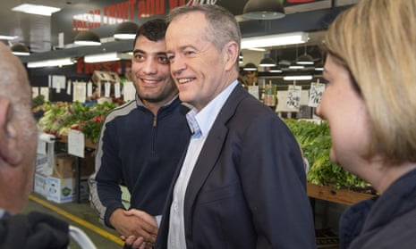Bill Shorten talks to shoppers and traders at a market in Melbourne on Saturday