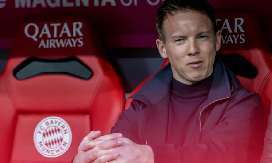Julian Nagelsmann sits in the Allianz Arena dugout at Bayern Munich as manager of RB Leipzig