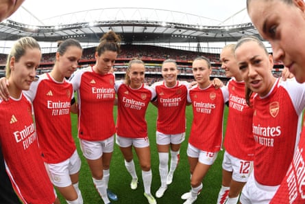 Jen Beattie in the Arsenal huddle before their WSL season-opener at the Emirates against Liverpool.