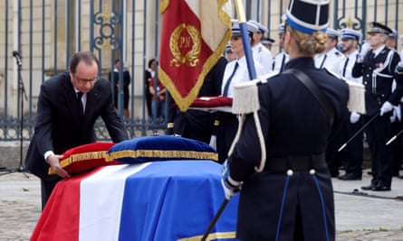 French president Francois Hollande at a memorial ceremony honoring the police couple killed in France this week.
