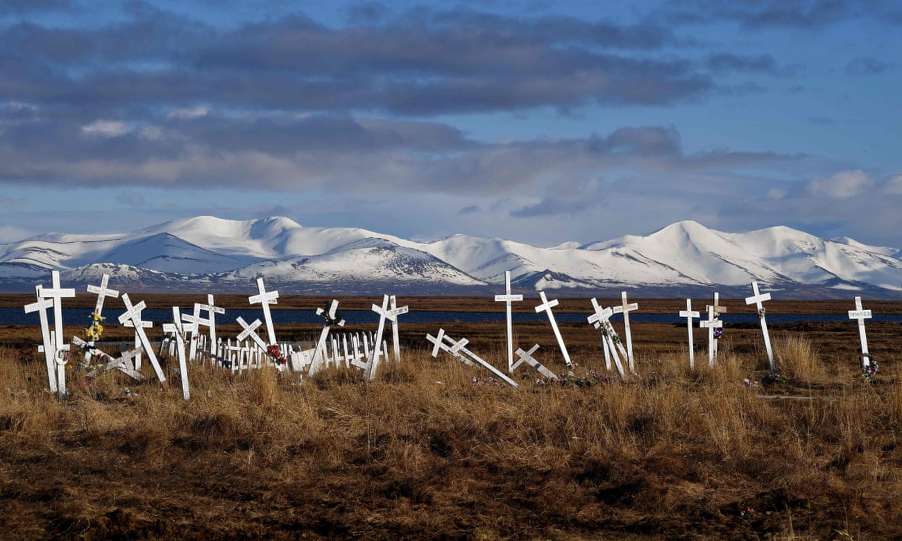 crosses topple slowly as the permafrost thaws in quinhagak alaska