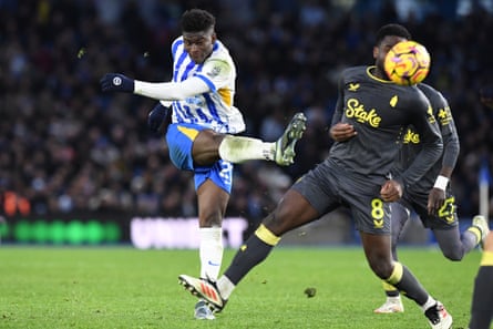 Carlos Baleba takes a shot during the Premier League match between Brighton and Everton.