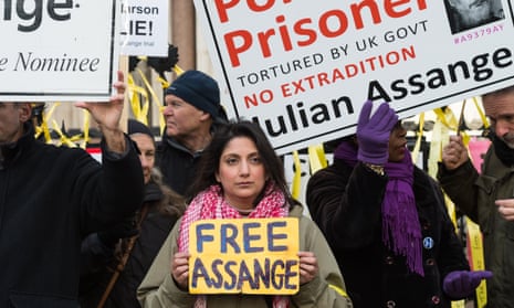Supporters of Julian Assange gather outside the high court in London on Friday.
