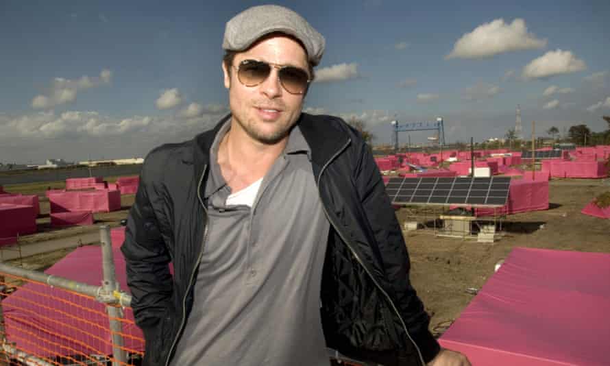 Brad Pitt is pictured before pink stand-in structures where 150 ecologically sustainable homes are to be built, on 3 December 2007 in the Lower Ninth Ward.