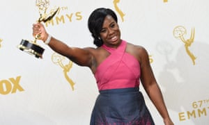 Uzo Aduba with her Emmy Award for Orange Is The New Black - now $1 per month more expensive.