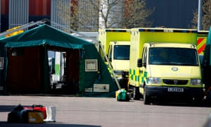Ambulances outside the NHS Nightingale hospital at the ExCeL centre in London.