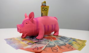 A stock image of a piggy bank with Australian notes