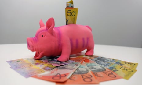 A piggy bank with money sticking out of it