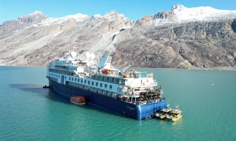 The Ocean Explorer, a luxury cruise ship, in Alpefjord, Greenland.