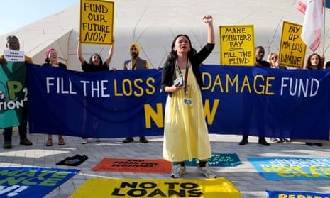 Activists participate in a demonstration for a loss and damage fund at the Cop28 UN climate summit in Dubai.