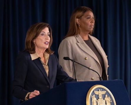 Kathy Hochul speaks next to Letitia James
