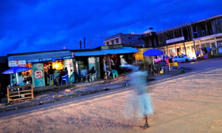 An evening street scene in the city of Gulu, Uganda.