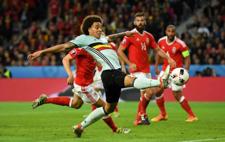Axel Witsel stretches but fails to reach the ball.