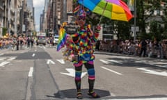 A man with an umbrella walks down Fifth Avenue during the annual New York Gay Pride Parade on June 25, 2017 in New York City. (Photo by Maite H. Mateo/VIEWpress/Corbis via Getty Images)