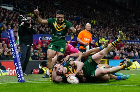Australia's Liam Martin scores his team's third try of the game.